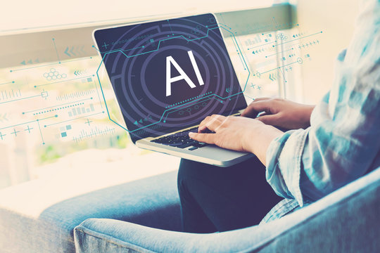 AI concept with woman using her laptop in her home office