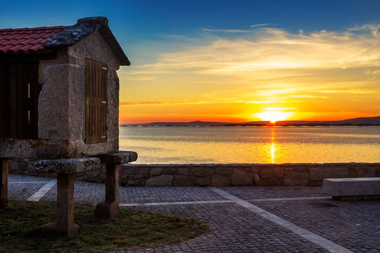 Sunset with traditional barn in Galicia