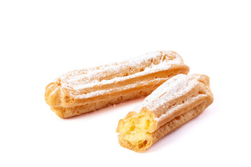 Eclairs isolated on white background. Delicious french dessert. Sweet dessert.