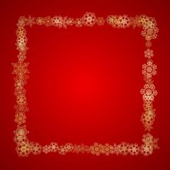 Fototapeta premium Christmas snowflakes on red background. Glitter frame for seasonal winter banners, gift coupon, voucher, ads, party event. Santa Claus colors with golden Christmas snowflakes. Falling snow for holiday
