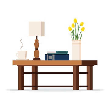 Vector image of wood coffe table with lamp, vase with tulips, books, cup of tea or coffee isolated on white background. Flat design cartoon style illustration. Element for interior background.