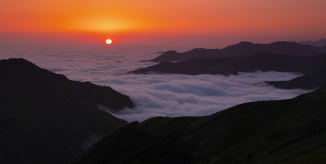 sunrise with sea of clouds in the Pyrenees mountain range