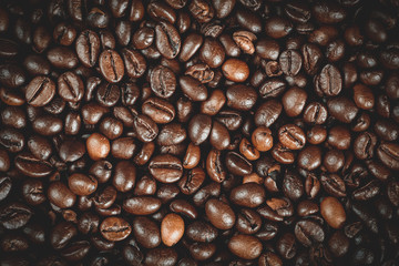Roasted coffee beans background, macro photo