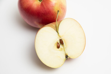 Ripe fruit of red-green Apple with half of Apple