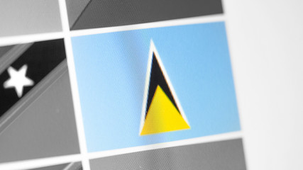 Saint Lucia national flag of country. Saint Lucia flag on the display, a digital moire effect.