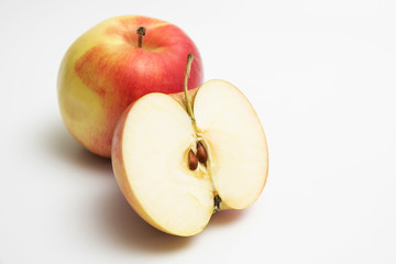 Ripe fruit of red-green Apple with half of Apple, copy space