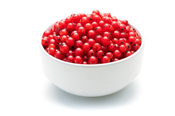 red currant in a white bowl on a white isolated background