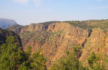 View on steep red cliff of Ourika valley - Morocco