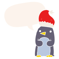 cute christmas penguin and speech bubble in retro style