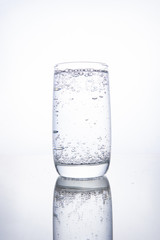 Full glass cup with carbonated pure mineral water