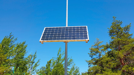 Street lighting using solar panel under the blue sky
