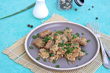 Fried Chicken Liver with Scramble Egg on Gray Clay Plate