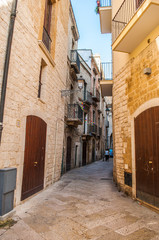 Fototapeta premium Narrow street in the old part of the city in Italy