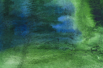 watercolor background abstract sheet of paper covered with multicolored paint blue green, grunge...