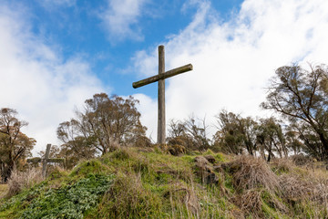 Christian wooden crosses in the Australian outback in a grassy field