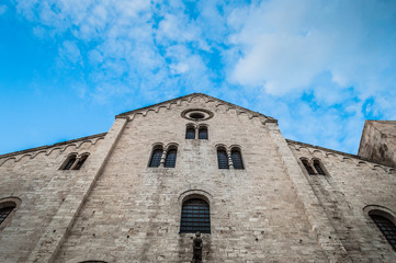 White ancient cathedral with blue sky on the background
