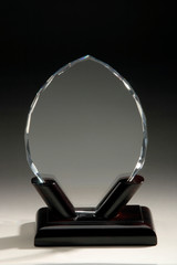 Transparent blank glass trophy award.