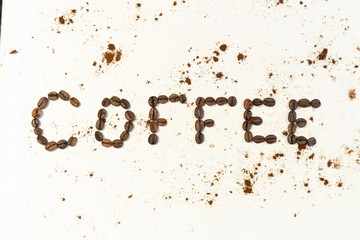 Coffee written with Coffee Beans 
