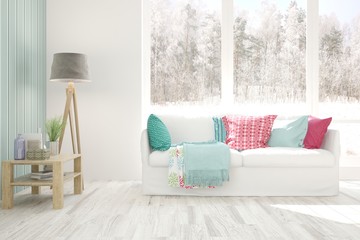 Stylish room in white color with sofa and winter landscape in window. Scandinavian interior design. 3D illustration