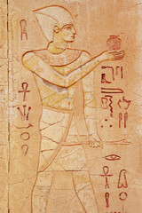 Old egypt hieroglyphs carved on the stone