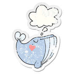 cartoon whale with love heart and thought bubble as a distressed worn sticker