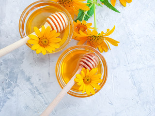 fresh honey yellow flower on gray concrete background