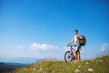 Image of male cyclist in nature