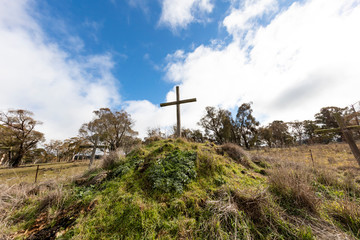 Christian wooden crosses in the Australian outback in a grassy field