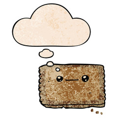 cartoon biscuit and thought bubble in grunge texture pattern style