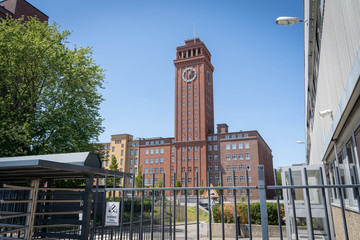 Famous clock-tower in Siemensstadt, a district of Berlin,  Sign says "ATTENTION! Video surveillance" in German