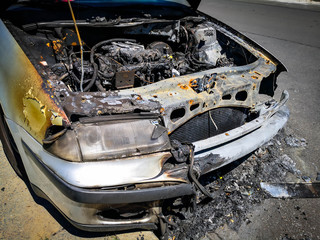 An abandoned, stolen burned out car