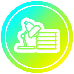 lamp and study books circular in cold gradient spectrum