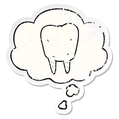 cartoon tooth and thought bubble as a distressed worn sticker