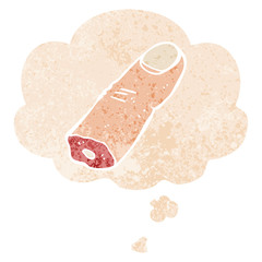 cartoon severed finger and thought bubble in retro textured style