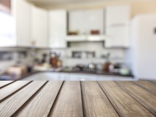 Worn table and blur with bokeh kitchen background