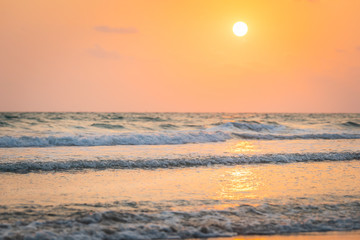 Fototapeta na wymiar Golden sunset over tropical beach, Beautiful dawn with sunset and nice beach