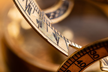 An Antique Brass Nautical Compass and Sundial.