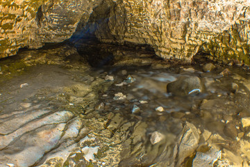 stream in rock cave