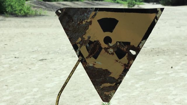 Closeup of an old rusted radiation radioactive sign in Chernobyl. Ukraine