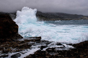California Stormy Coast with Breaking Wave Spraying