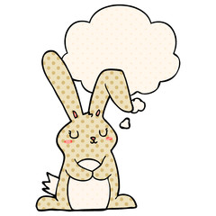 cartoon rabbit and thought bubble in comic book style