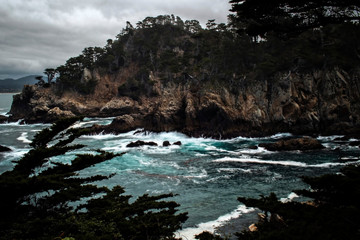 Stormy California Coast with Blue Ocean on Rocky Shore