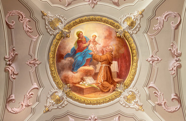 Fototapeta na wymiar MENAGGIO, ITALY - MAY 8, 2015: The neobaroque fresco of Anthony of Padua in church chiesa di Santo Stefano by Luigi Tagliaferri (1841-1927).