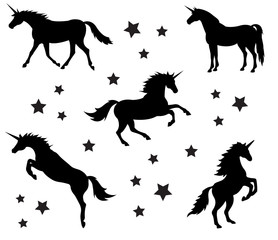 Vector set of different black flat silhouettes of unicorn isolated on white background