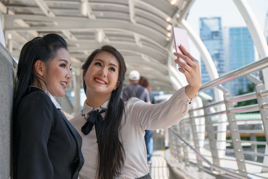 business asian women having selfie together