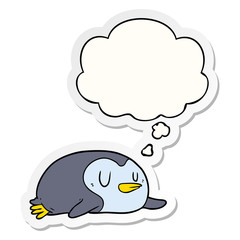 cartoon penguin and thought bubble as a printed sticker