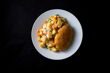 Chicken kiev, potato and vegetable