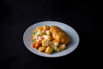 Chicken kiev, potato and vegetable