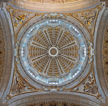 COMO, ITALY - MAY 8, 2015: The baroque cupola with the scucco of Four Evangelist in Cathedral (Duomo di Como) by Gaspare Mola di Coldrerio from 17. cent.