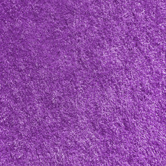 Purple abstract background. Purple grass texture. Texture of purple fur. Artificial color fur. Fur...